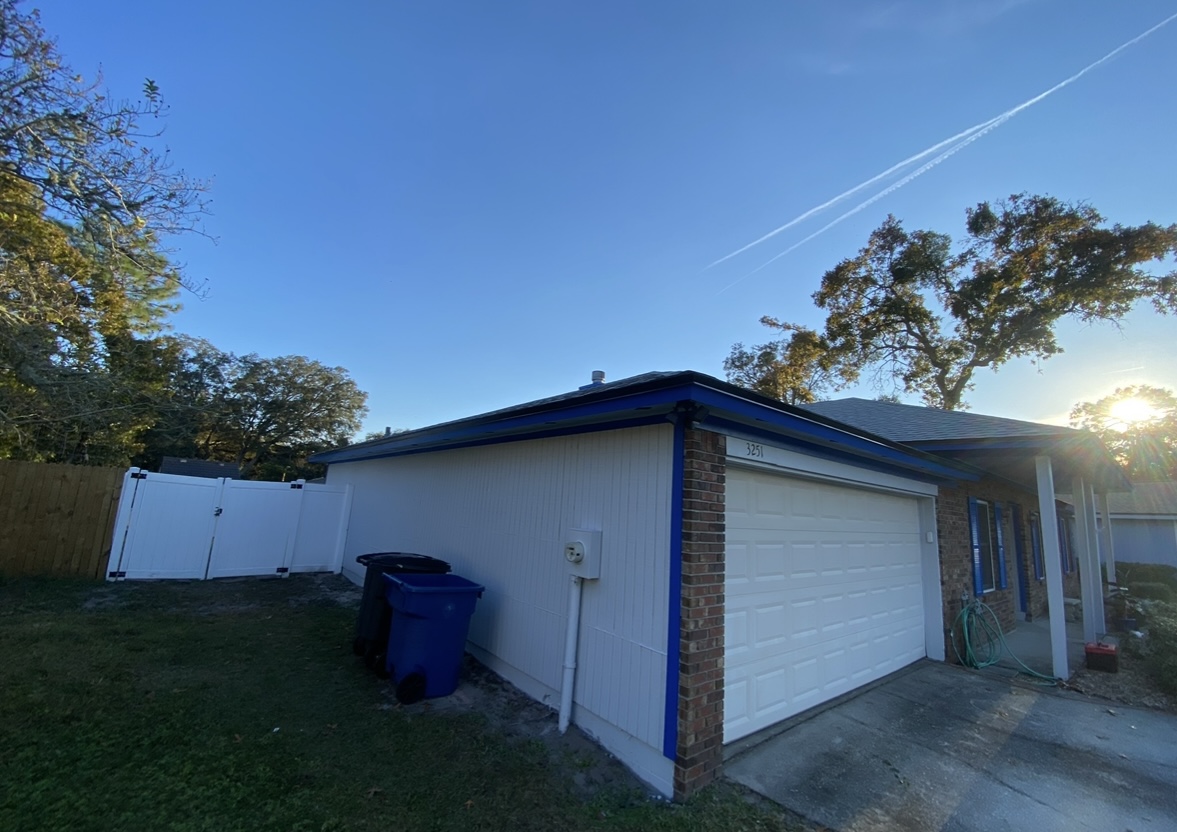 Exterior side of home before or during paint preparation